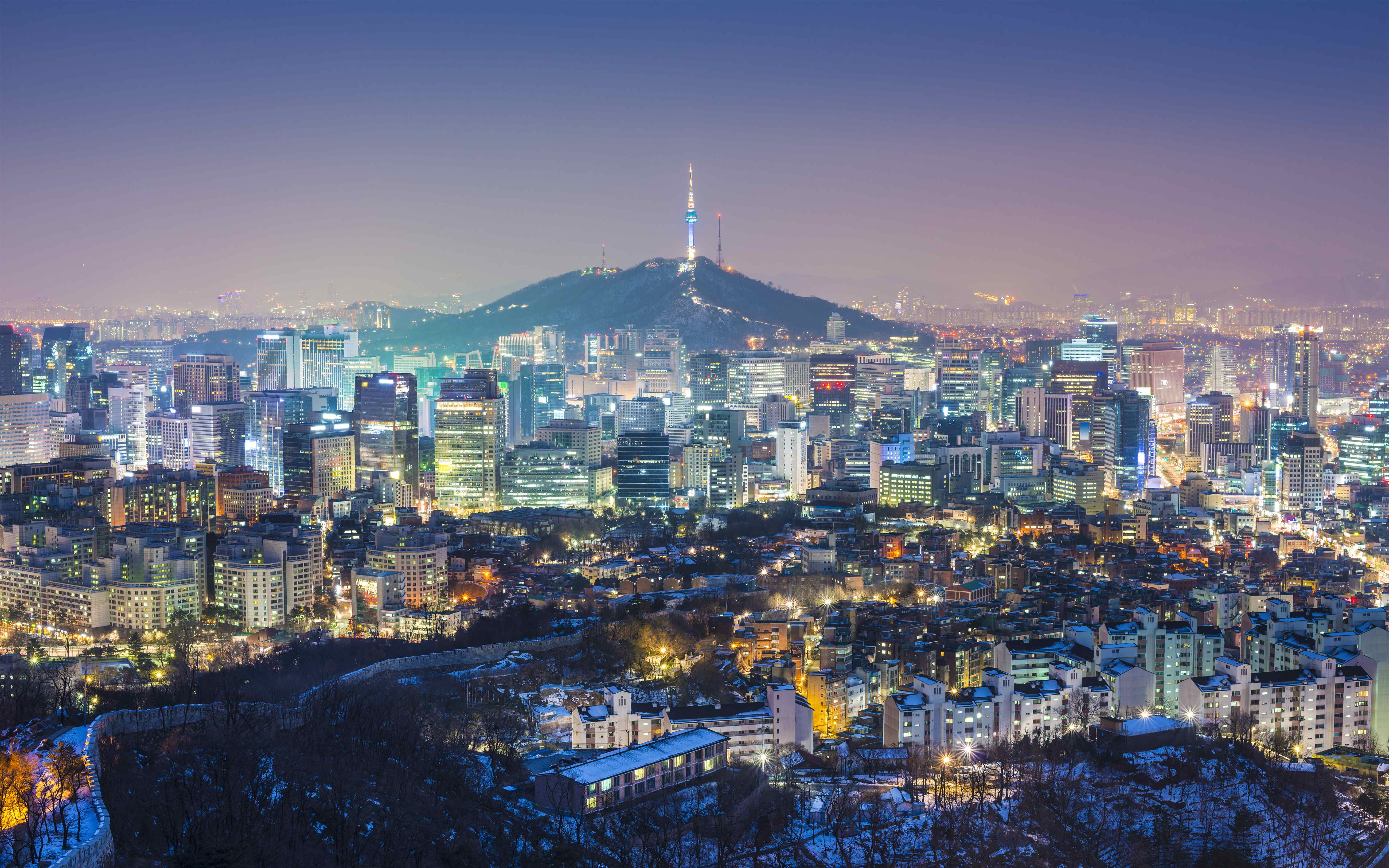 Seoul skyline at dusk with Namsan Tower in the distance